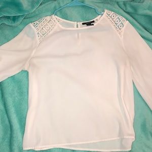 Light cream blouse with lace accent shoulders